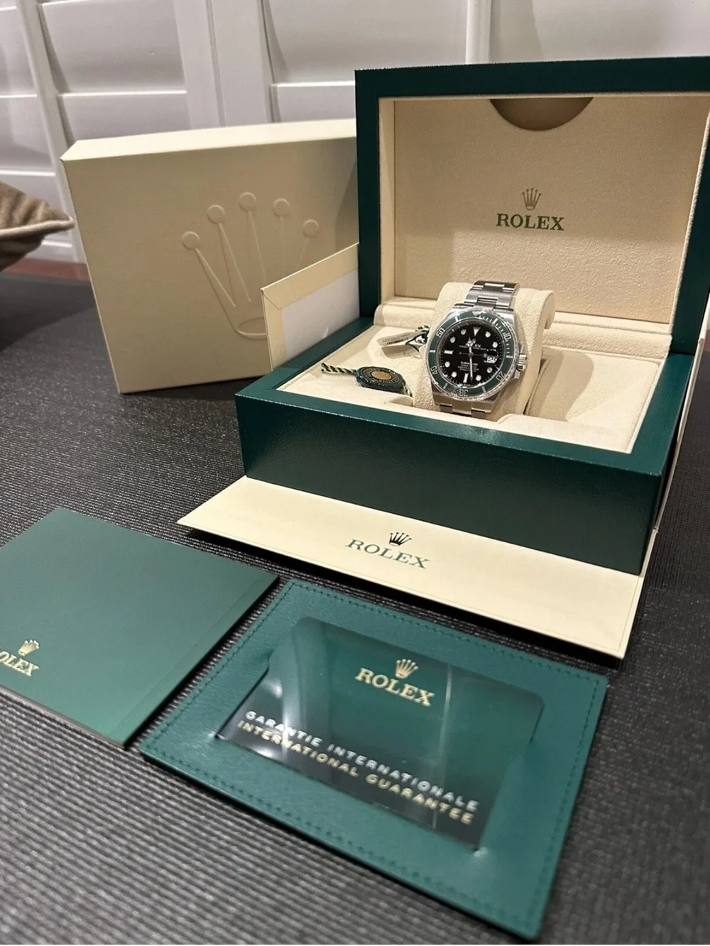 Rolex Submariner Stainless Steel Watch with Green Bezel and Black Dial